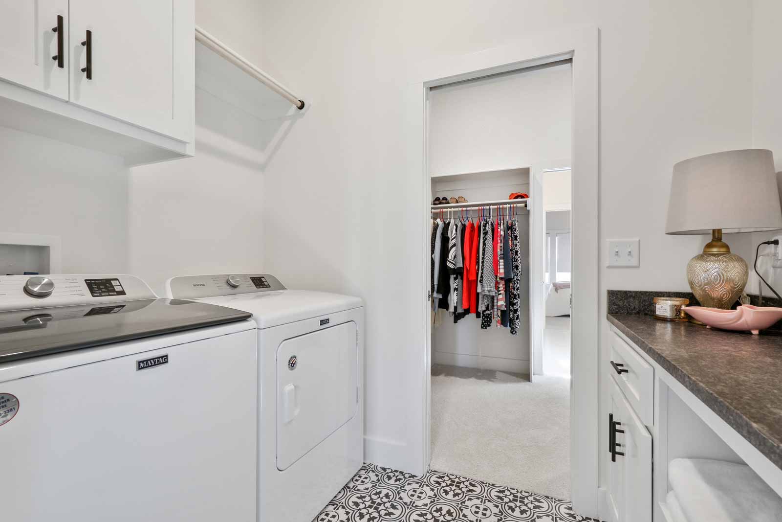 Laundry room attached to closet in Kenneth Estates home