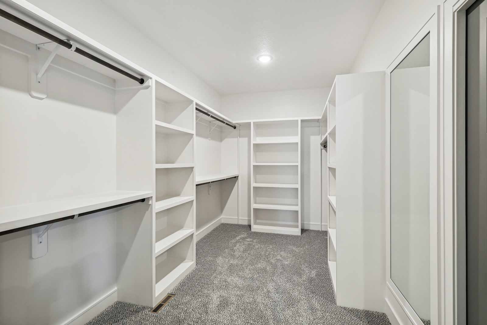 Large walk-in closet in a Kenneth Estates home