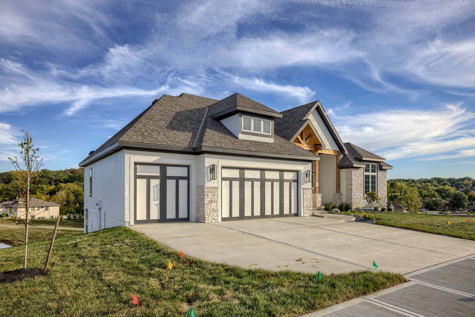 Home with detailed garage doors in Kenenth Estates