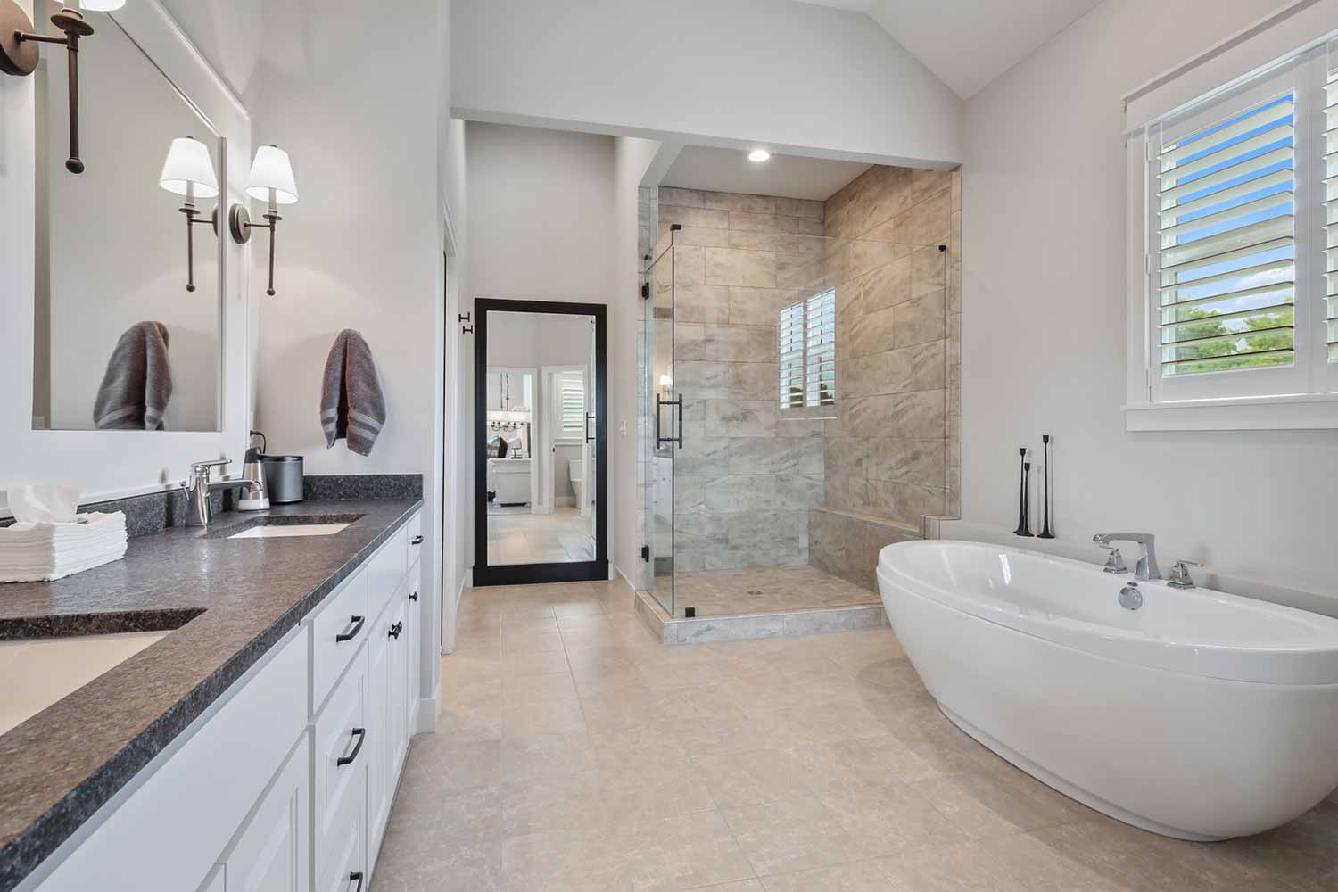 Master bathroom with large walk-in shower and tub